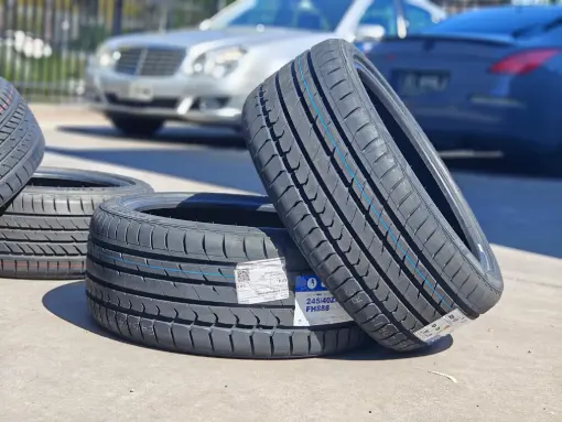 Stacked tyres in a Mufamo Automotives warehouse
